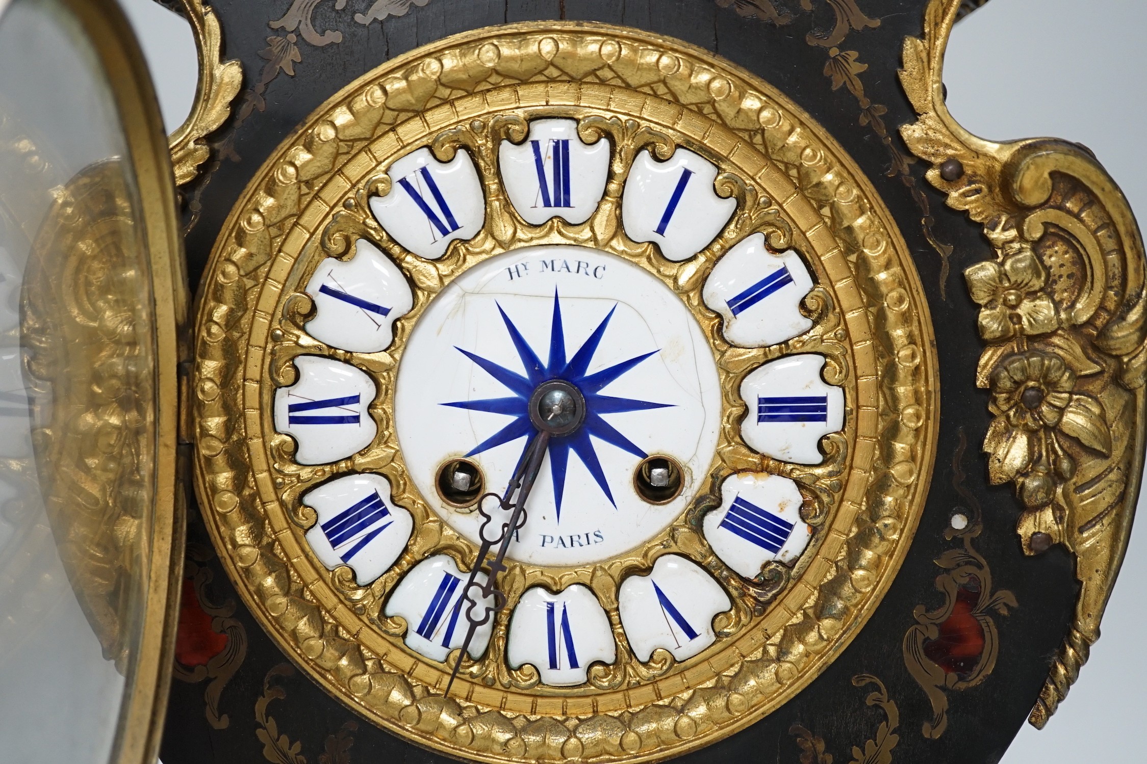 Henry Marc of Paris - A late 19th century French Louis XV style ormolu mounted boulle inlaid eight day mantel clock. (dial cracked), height 42cm